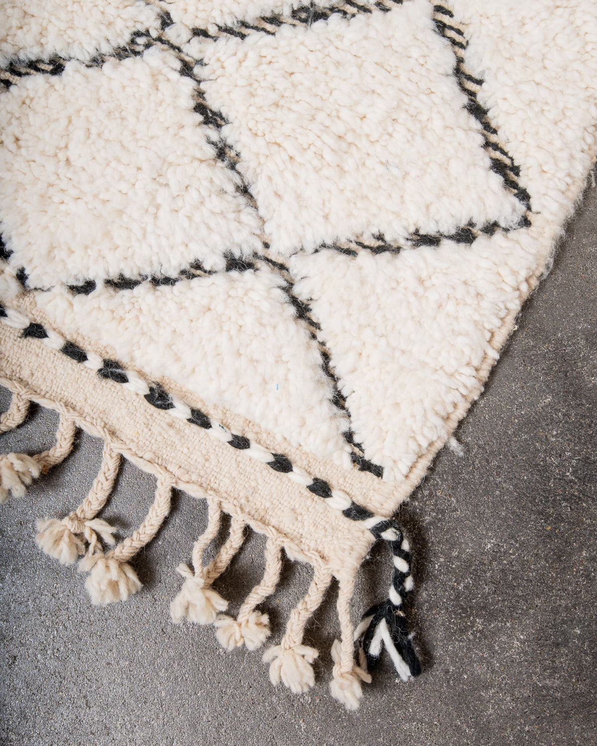 Modern, designer, handcrafted Berber rug from Morocco. Beniourain carpet with beautiful colours and patterns and fluffy wool texture.